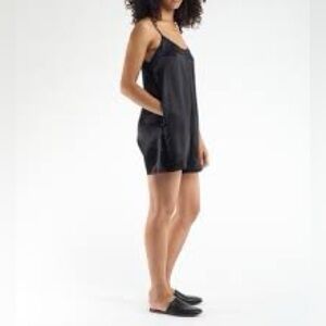 New Black Romper  with pockets on the sides.